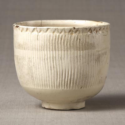 Bowl with lotus flower design<br /><span>Cizhou ware. Northern Song dynasty, 11th to 12th century. 10.0×12.0cm.</span>