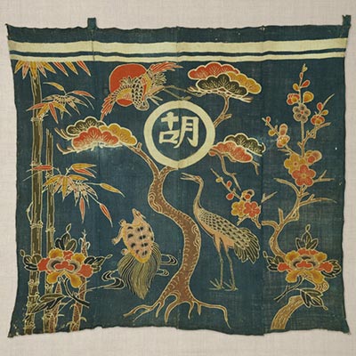 Stage curtain with design of auspicious motifs of crane, tortoise, pine tree, and plum blossom<br /><span>ramie, <i>tsutsugaki</i> (paste-resist dyeing). Naha. 19th century. 175.0×200.0cm.</span>