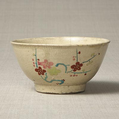 Bowl with plum blossoms and bamboo design, overglaze enamels<br /><span>Tsuboya. Ryukyu Kingdom period, 19th century. 7.3×13.5cm.</span>