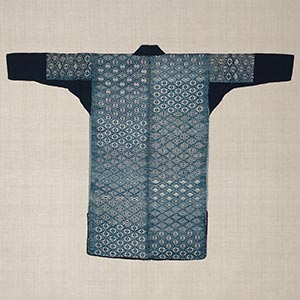 Garment with quilted <i>hishizashi</i>, stitched with cotton thread on hemp cloth.<br /><span>Nambu area, Aomori prefecture. Meiji period, 19th century. 97.5×132.0cm.</span>