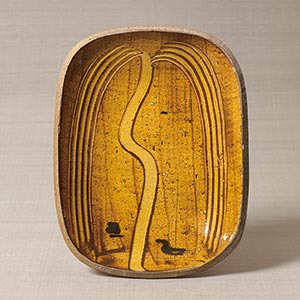 Oval plate with willow design, galena glaze<br /><span>Bernard Leach. St.Ives, England, 1952. 5.6×25.8×33.4cm.</span>